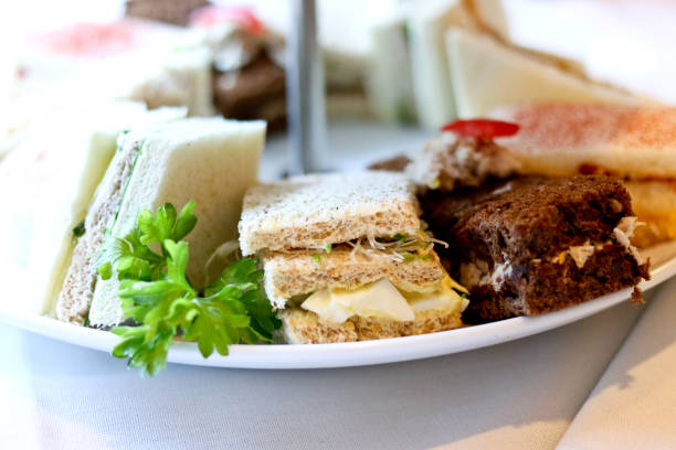 istock gourmet finger sandwiches with afternoon tea 955063476