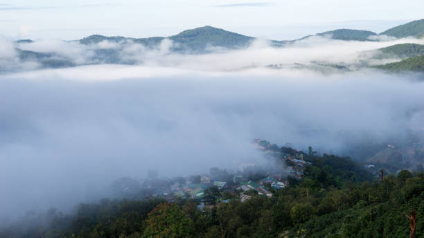 istock Small village in the fog 955070768