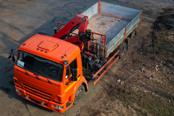 istock Truck with remote control crane on the road. 955071180