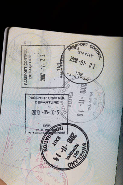 istock Rubber stamps in passport 955075440