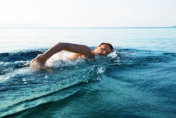 istock Man swimming in ocean 95507820