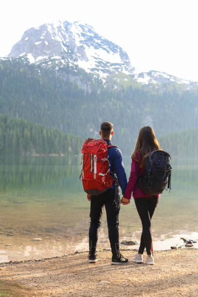 istock Young couple on mountain 955078516