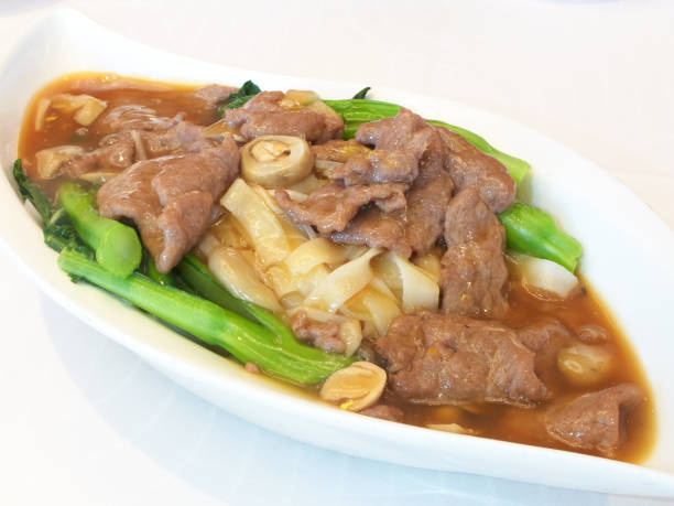 Cantonese style Ho Fun (flat rice noodle) with beef, mushroon, and vegetables