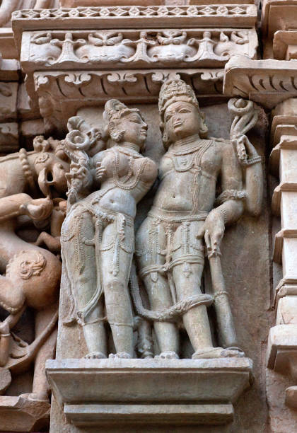 istock Bas relief at famous ancient temple in Khajuraho, India 955083660