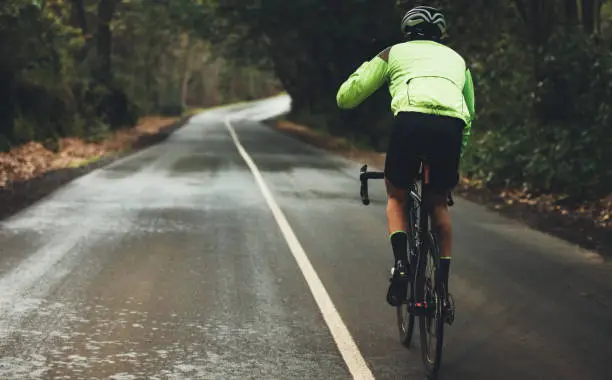 Photo of Cyclist practising on a rainy day