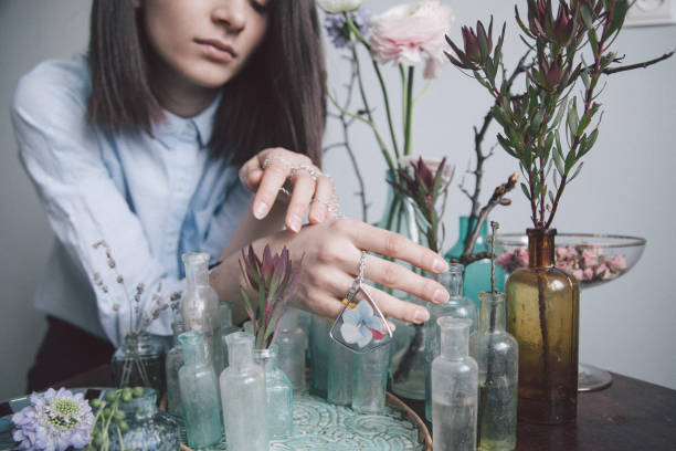 istock Young woman with flower 955085170