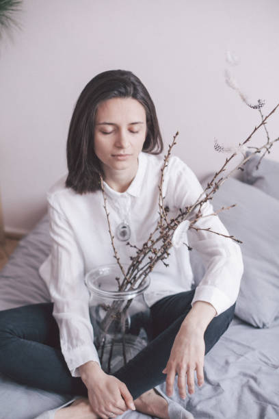 istock Young woman in bedroom 955085726