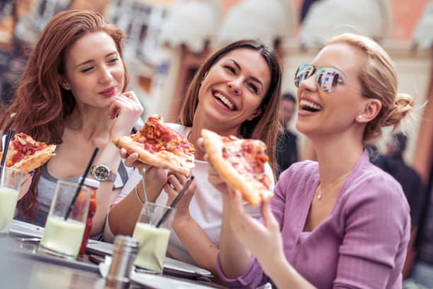 istock Friends having fun in cafe 955088218