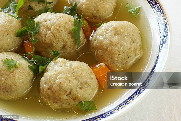 Closeup Of Matzo Ball Soup Decorated With Herbs And Carrots Stock Photo - Download Image Now