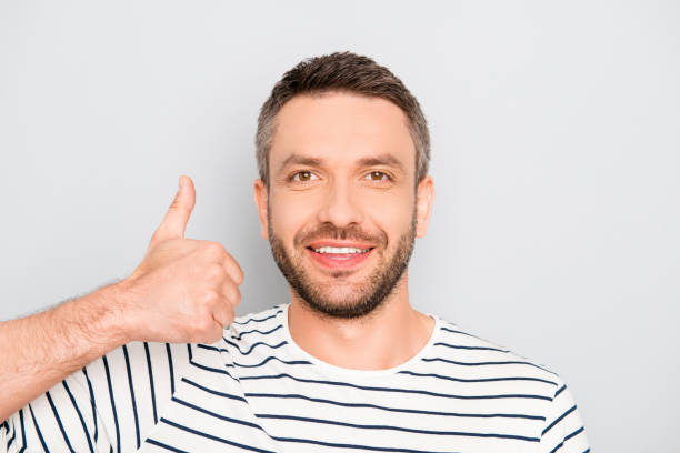 istock Portrait of happy young handsome man gesturing 