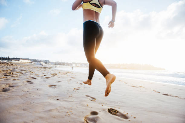 istock Afternoon running at the beach 955103672