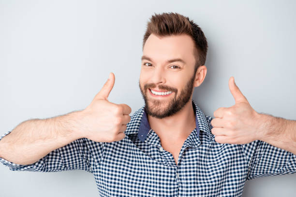 istock Portrait of cheerful young bearded guy gesturing 