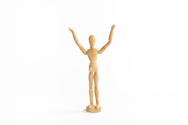 istock A wood figure model in worship God action. 955115552