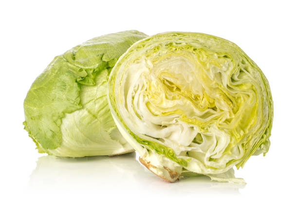 istock Fresh Raw Iceberg Lettuce isolated on white 955116958