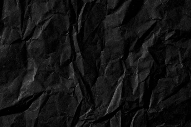 istock abstract background with black wrinkled paper 955117142