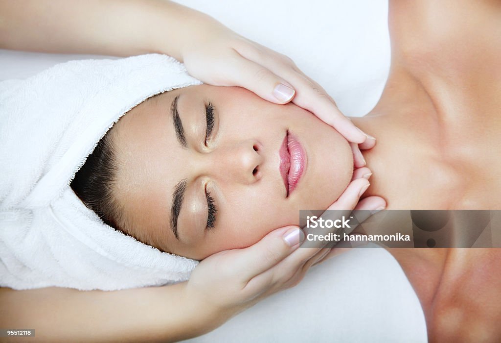 Young beautiful woman receiving facial massage  20-29 Years Stock Photo