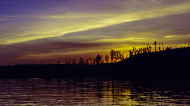 istock Colorful sunset on a lake background 955123660