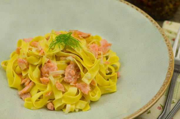 istock Pasta with salmon. Tagliatelle with salmon 955126858
