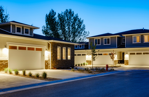 A suburban USA neighborhood at dusk.