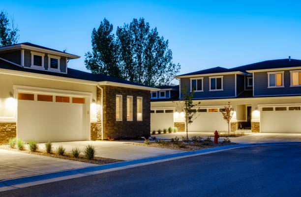 Suburb Houses at Dusk A suburban USA neighborhood at dusk. duplex photos stock pictures, royalty-free photos & images