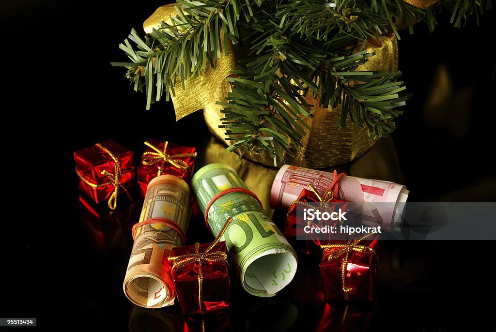 Euros as Christmas presents  Christmas Tree Stock Photo