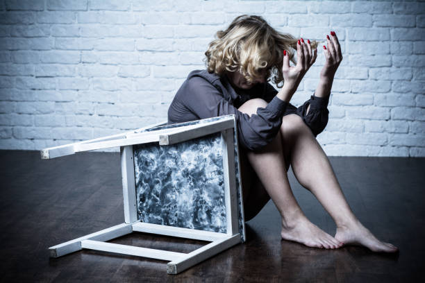 istock A young woman and a chair. 955136226