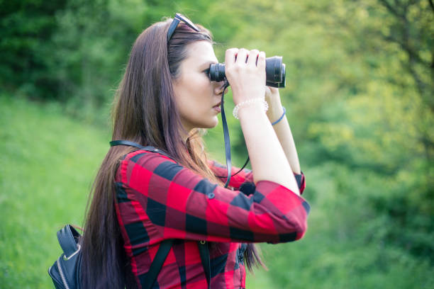 istock Young woman exploring nature. 955139076