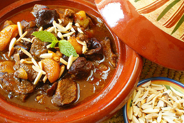 Morrocan beef stew with plums and dried apricots  tajine stock pictures, royalty-free photos & images