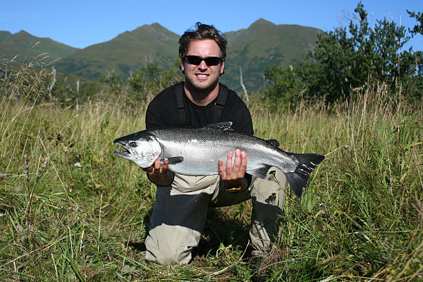 Silver salmon Fisherman  kodiak island photos stock pictures, royalty-free photos & images