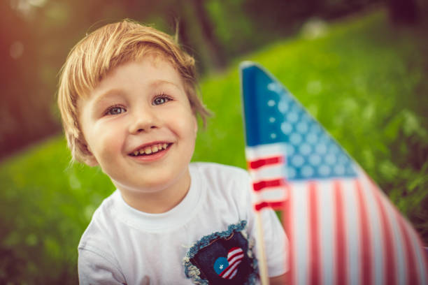 istock Little boy celebrating Fourth of July 955144054
