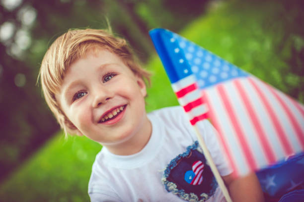 istock Little boy celebrating Fourth of July 955144366