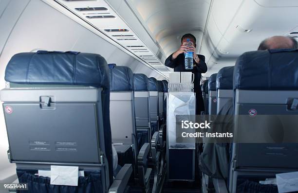Flight Attendant Stock Photo - Download Image Now - Airplane, Cabin Crew, Cart