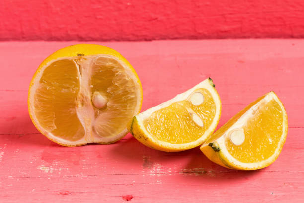 istock Bergamot oranges color yellow on old wood 955149062