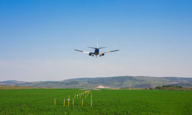 istock airplane landing on airport runway 955153692