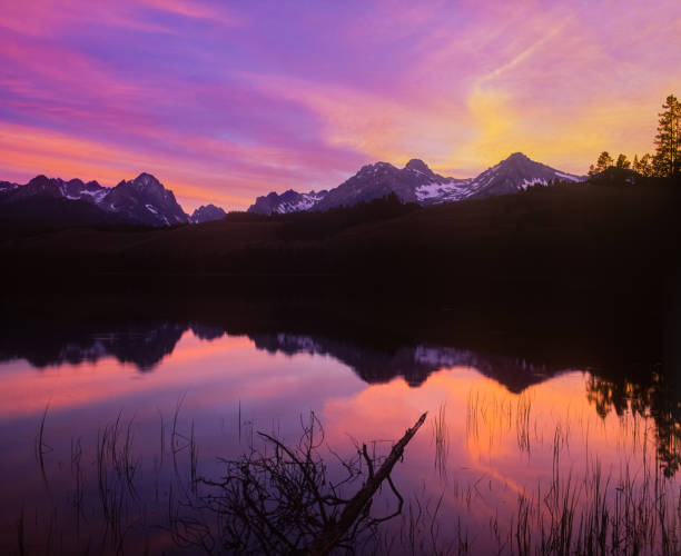 Sunset at Little Redfish Lake in The Sawtooth Mountain Range, Stanley Idaho (P) tranquil getaway; a breathe of fresh air; away from it all; springtime travel adventure, Sawtooth National Forest sawtooth mountains photos stock pictures, royalty-free photos & images