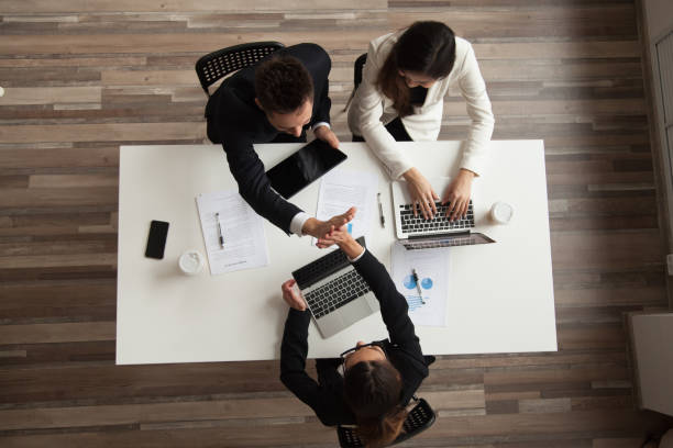 istock Top view of worker giving high five to colleague 955158520