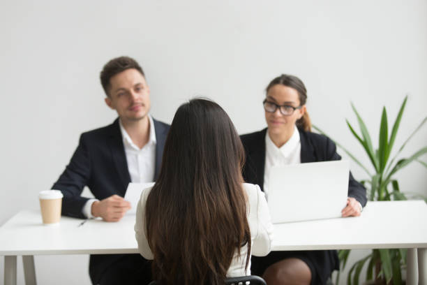 istock Headhunters interviewing female job candidate 955158570