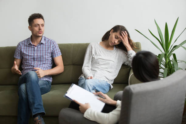 istock Couple receiving psychological help from expert 955158766