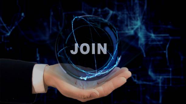istock Painted hand shows concept hologram Join on his hand 955161782