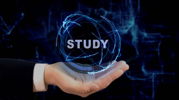 istock Painted hand shows concept hologram Study on his hand 955161926
