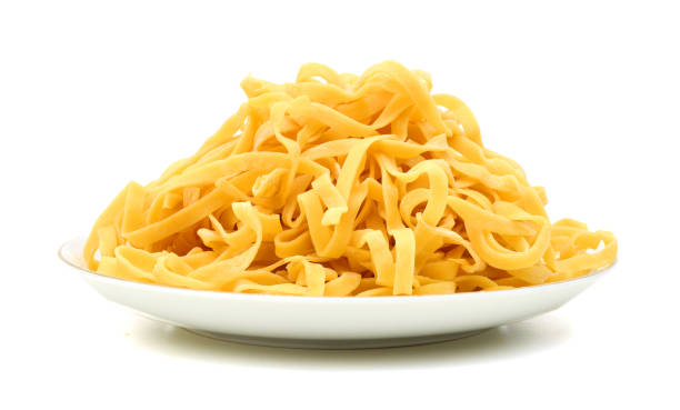 istock A portion of tagliatelle pasta in plate  isolated on white 955162092
