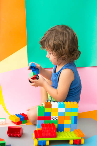 istock Happy child playing with Preschoolers Building Blocks 955169182