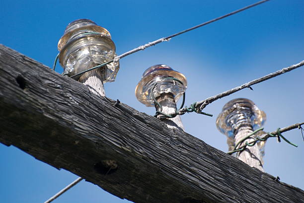 Old glass insulators stock photo