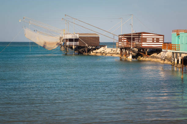 istock Trabucchi, particular fishing structures based on nets operated from wooden huts. Cesenatico, Emilia Romagna, Italy. 955172938