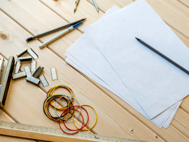 istock top down cute office work place on a wooden surface 955180728