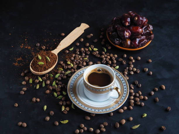 Black coffee with cardamom and dates. Traditional Arabic coffee. Black coffee with cardamom and dates. Cardamom stock pictures, royalty-free photos & images