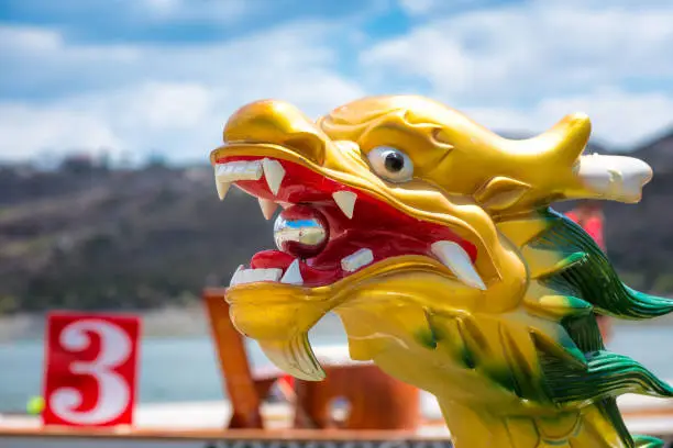 Carved and painted dragon head of a Dragonboat.