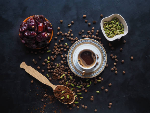 Black coffee with cardamom and dates. Traditional Arabic coffee.