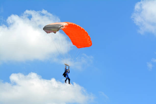 Parachute landing stock photo