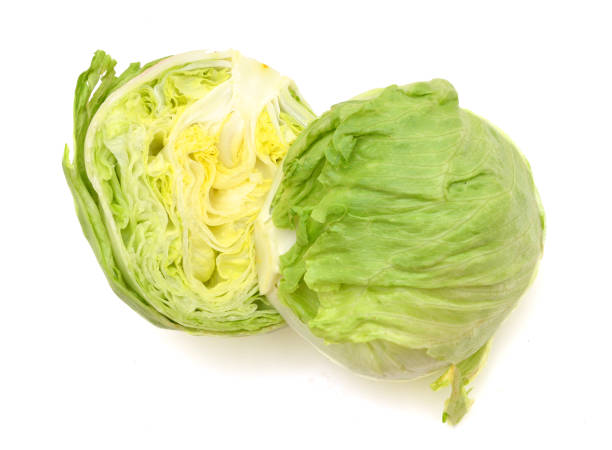 istock fresh iceberg salad isolated on white 955198910